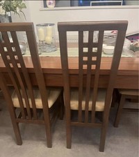 Glasswells Dining Table and 4